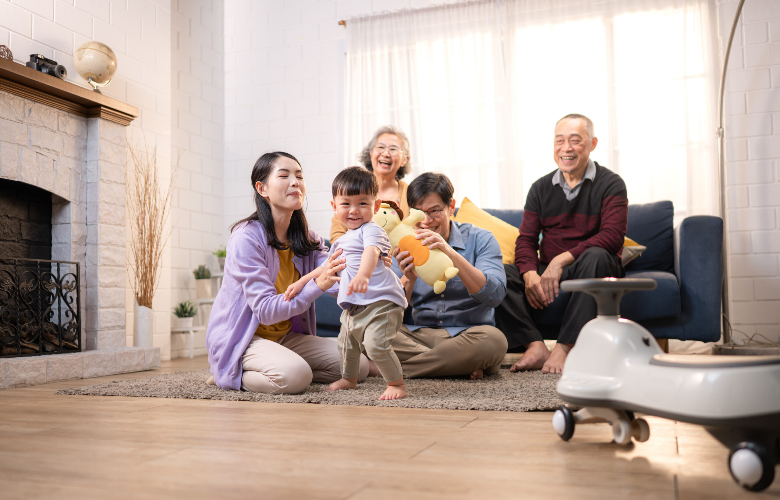 Happy multi-generational Asian family enjoying quality time toge